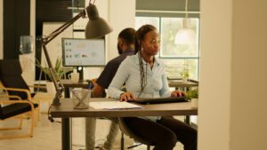 Focused employees in a clean office environment increasing productivity.