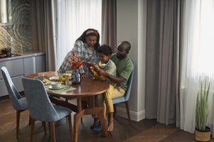 Family bonding in a clean and organized dining space.