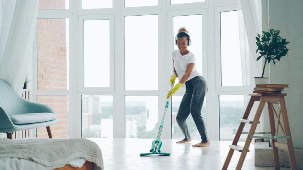 Regular cleaning of a Nigerian living room with a mop